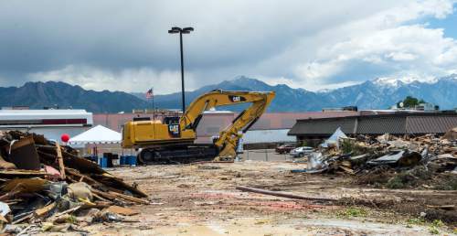 Chris Detrick  |  The Salt Lake Tribune
Demolition of vacant businesses near 5400 South and 1750 West Tuesday June 9, 2015.